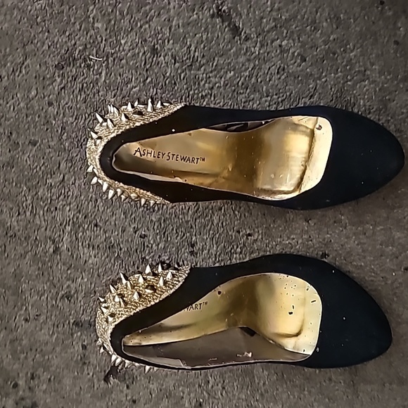 Practically new black swayed heels with gold steads and spikes on the back. - Picture 1 of 3